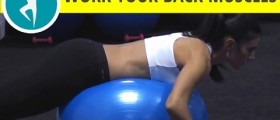 Workout for back muscles: Bent over dumbbell row on an exercise ball