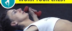 Chest, triceps and shoulders workout: dumbbell flies on an exercise ball