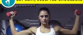 Shoulders workout: standing dumbbells press with palms facing in