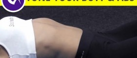 Workout to tone your butt and abs: crunches on an exercise ball